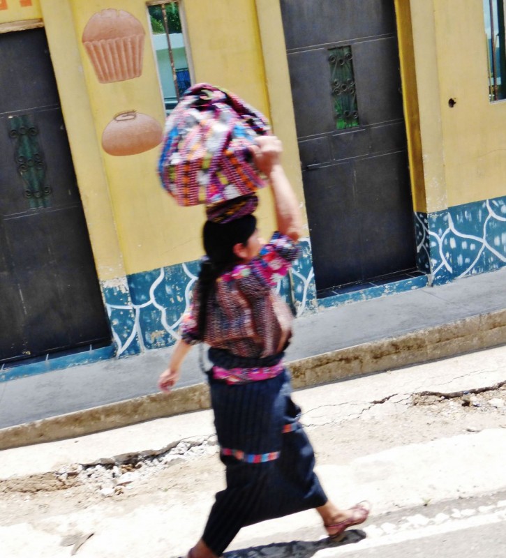 Over the last 3 months of travel, we have seen many women carrying a myriad of things on their head.  The ones that are able, pride themselves on balancing heavy loads without using their hands.  I missed the photo shot, but saw one woman carrying a full sized cooler without holding on!
