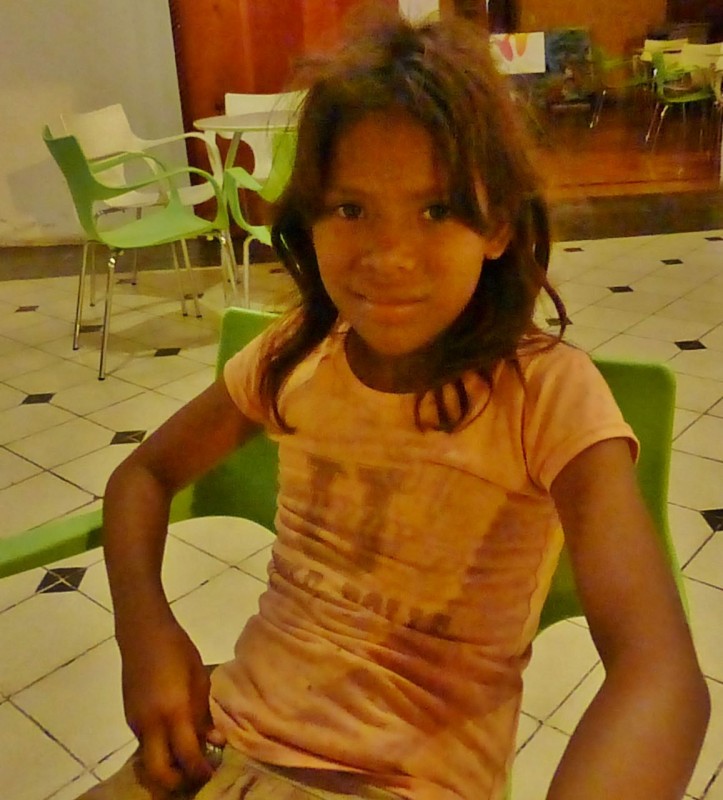 There is always a sad side to these Central American cities and you are always reminded these are impoverished countries despite the sometimes shiny veneer.  An example is this street child who was begging in an ice cream shop. She plopped tiredly into a chair, and Kat managed a slight smile from her as she snapped this shot at ten o’clock at night.  Where did this little girl sleep that night while we snuggled in our fancy hotel?