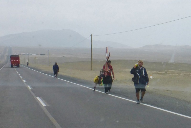 Along the Pan Am heading toward Lima we passed dozens of religious pilgrims walking north. Some were hauling huge crosses with a wheel affixed to their end to ease in dragging them along. 