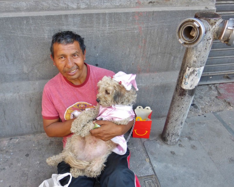 We walked passed this guy and his princess-clad pup and I had to get a shot.  He happily accepted a 10 Peso note (about $1.20) for the favor of taking his photo.  Note the McDonald’s Happy Meal box.