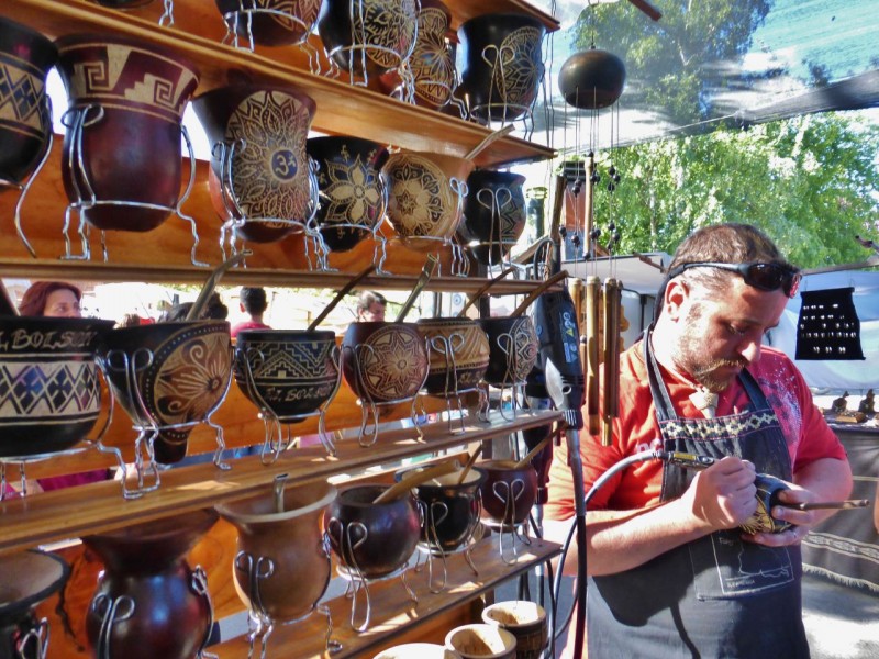 Unlike many “Artisan” fairs, where it seems most of the wares are mass produced, the artists here displayed beautiful, hand crafted art.  This man was carving lovely designs on gourds for drinking mate (pronounced ma-tay).  Mate, short for Yerba Mate, is an herb which is packed in a mate vessel (of choice), covered with hot water and drunk through a straw-like contraption (called a bombilla).  Argentineans love their mates and are often seen ambling down the road, sipping on their mates with hot water thermoses (for refills) slung over a shoulder.   